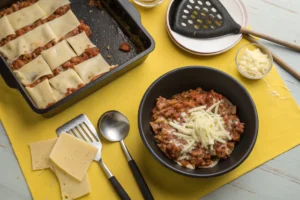 Step-by-step assembly comparison of baked ziti and lasagna on a yellow and black background.